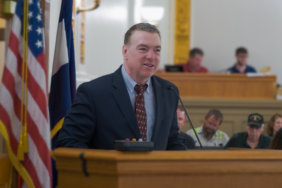 Mesa County Administrator Peter Baier in public hearing room. 