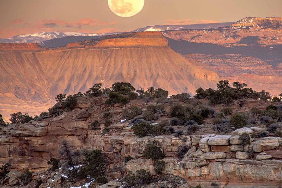 Photograph of Mt. Garfield with a full moon in the background