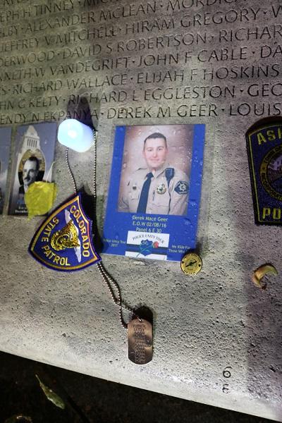 Photograph of Deputy Geer National Law Enforcement Officers Memorial with with photo under his name